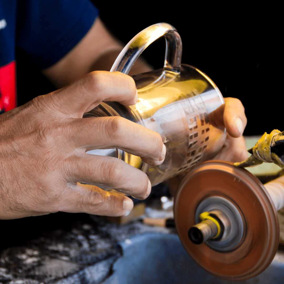 A silver tankard, hand-engraved and polished on the lathe.